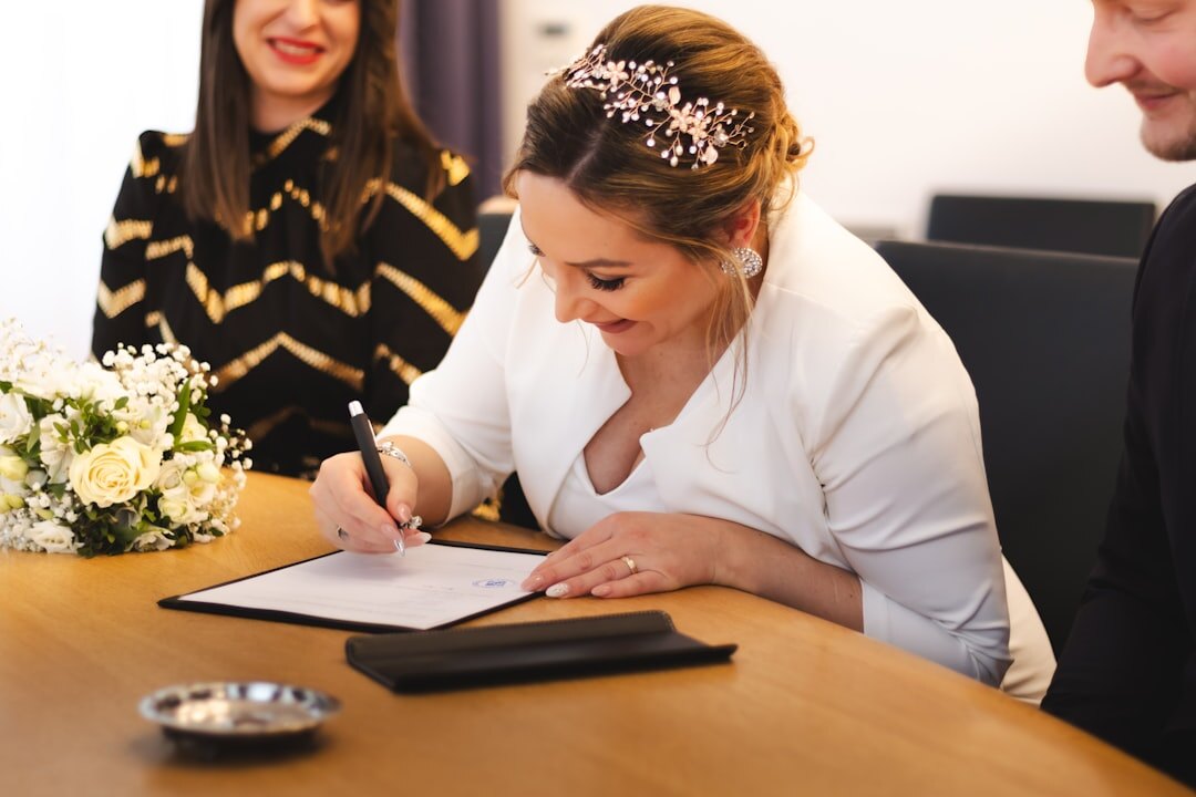 couple signing documents